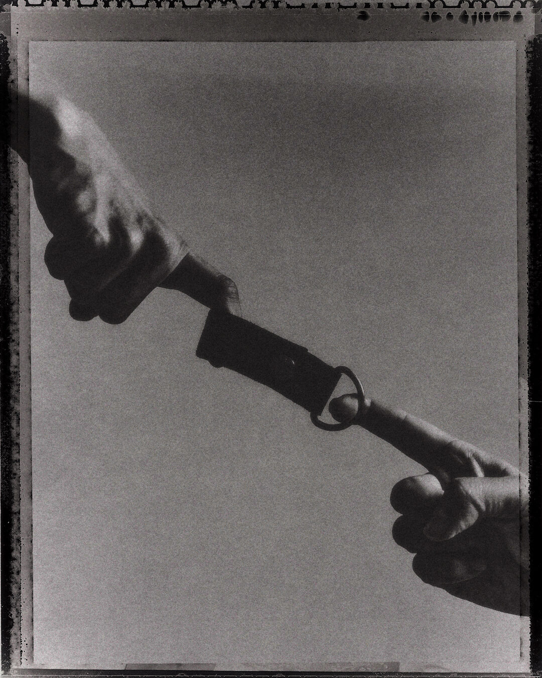 A black-and-white image combining a Carhartt WIP product and a bodily symbol. Image 2.