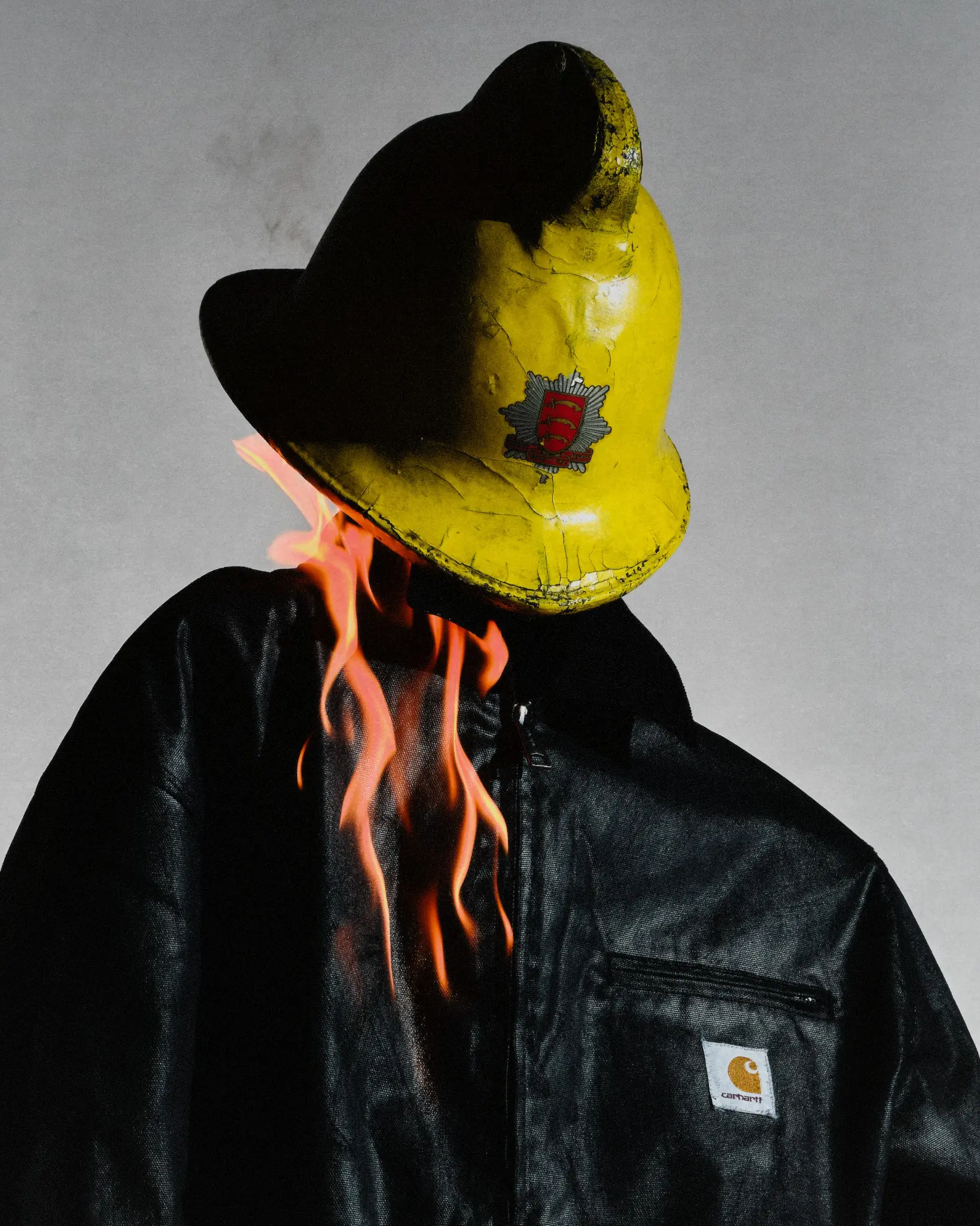 A black-and-white image combining a Carhartt WIP product and a bodily symbol. Image 6.
