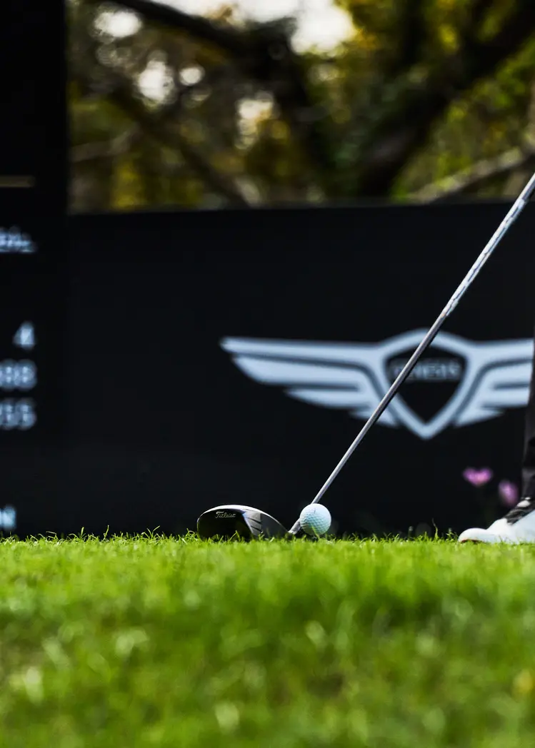 A moving figure and a player on the course during the KPGA event in Jeju. Image 7.